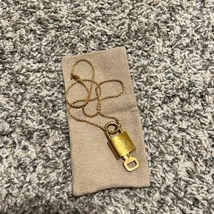 Louis Vuitton Repurposed Authentic Designer lock necklace. Hand-made!